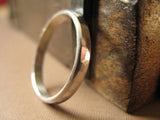 Sterling silver ring faceted band